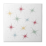 Funky Atomic Starbursts Mid Century 1950s Tile<br><div class="desc">Funky up your tiling project with this fabulous atomic era starburst mid century ceramic tile. This design features starbursts in red,  blue,  green,  and yellow and accented with black dots.</div>