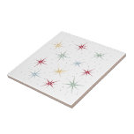 Funky Atomic Starbursts Mid Century 1950s Tile<br><div class="desc">Funky up your tiling project with this fabulous atomic era starburst mid century ceramic tile. This design features starbursts in red,  blue,  green,  and yellow and accented with black dots.</div>