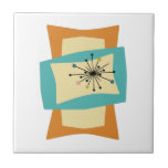 Funky Squeezed Rectangles Mid Century Modern Tile<br><div class="desc">This funky mid century modern ceramic tile features squeezed and stretched rectangle shapes in the colours turquoise blue, cream, and orange. Starburst accents in pink, blue, gold, and black highlight the design. Add that funky retro accent to your tiling project!</div>