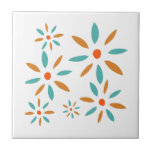 Funky Turquoise And Orange Mid Mod Retro Flowers Tile<br><div class="desc">Funky up your tiling project with this fabulous mid century flowers ceramic tile. This design features abstract flowers in turquoise blue and two shades of orange.</div>