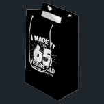 Funny 65th Birthday Quote Sarcastic 65 Year Old Small Gift Bag<br><div class="desc">This funny 65th birthday design makes a great sarcastic humour joke or novelty gag gift for a 65 year old birthday theme or surprise 65th birthday party! Features "I Made it to 65 Years Old... Nothing Scares Me" funny 65th birthday meme that will get lots of laughs from family, friends,...</div>