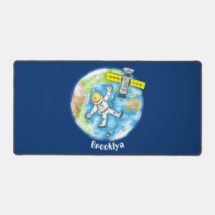 Funny astronaut in space and earth cartoon desk mat