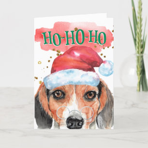 Funny beagle wearing Santa hat with greeting Holiday Card