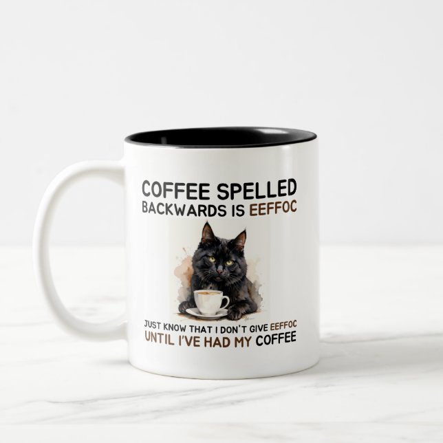 Funny Black Cat Coffee Spelled Backwards is Eeffoc Two-Tone Coffee Mug (Left)