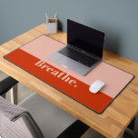 Funny Breathe Modern Minimalist Bold Orange Pink Desk Mat<br><div class="desc">Add some fun and personality to your workspace with this funny desk mat! This desk mat features a hilarious motivational quote that will make you smile every time you look at it. Whether you work from home or in an office, this desk mat will brighten up your day and keep...</div>