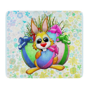 Funny Bunny biting an Easter Egg Cutting Board