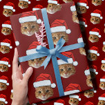 Funny Cat Custom Face Photo Santa Hat Christmas Wrapping Paper<br><div class="desc">Funny Cat Custom Face Photo Santa Hat Christmas, Replace the face of this cat with your favourite photo (make sure to crop as much to the face as possible and use an app to remove the background) and personalize this funny Christmas Holiday Wrapping Paper with your kid, husband, or boyfriend...</div>