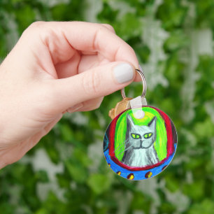 FUNNY CAT IN UFO CARTOON KEYCHAIN