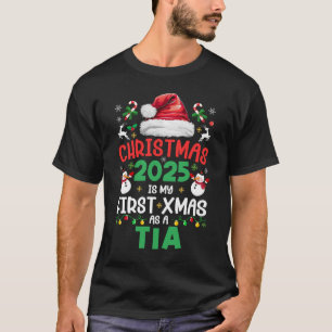 Funny Christmas 2025 Is My First Xmas As A Tia Fam T-Shirt