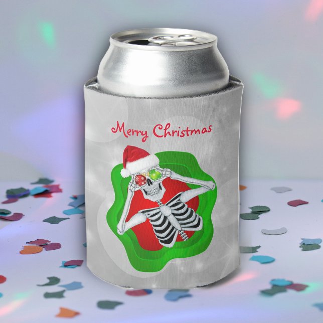 Funny Christmas Skeleton in Splatter Ornament Eyes Can Cooler (Funny Merry Christmas skeleton in splatter with ornament eyes Santa Hat on can cooler.)