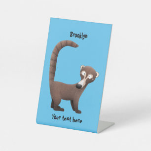 Funny curious coatimundi cartoon illustration  pedestal sign