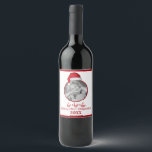 Funny Cute Red Christmas Santa Custom Photo Wine Label<br><div class="desc">Painted whimsical Santa hat with fluffy white trim and red velvet. Merry Christmas greeting to everyone with this fun,  cute,  whimsy design. A painted effect for the fluffy white fur as well as the deep reds for Santa's velvety hat. Make your Christmas merry and bright with this fun design.</div>