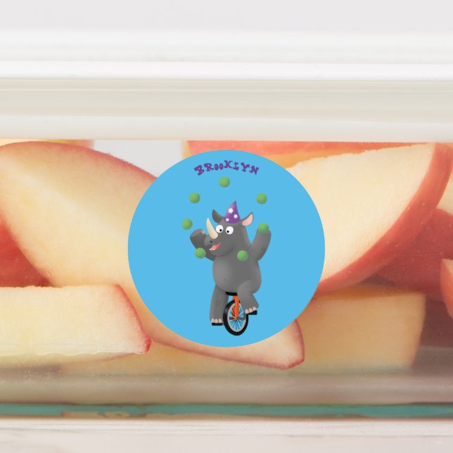 Funny cute rhino juggling on unicycle (Affixed)