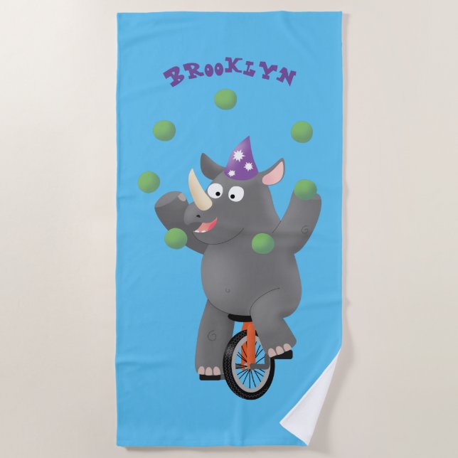 Funny cute rhino juggling on unicycle beach towel (Front)