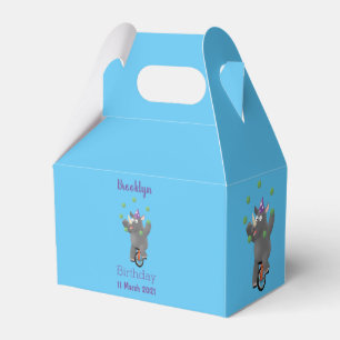 Funny cute rhino juggling on unicycle favor box