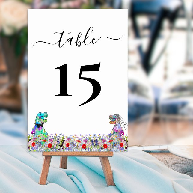 Funny Dinosaur Bride & Groom Wedding Table Number (Funny Dinosaur bride and groom custom wedding table numbers Colorful wildflower meadow boho florals)