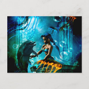 Funny dolphin playing with cute mermaid postcard