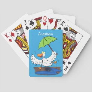 Funny duck with umbrella dancing cartoon playing cards
