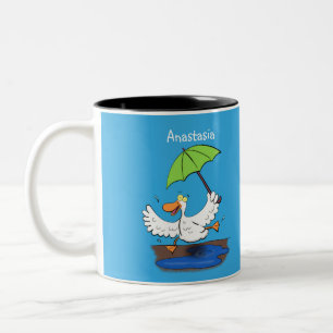 Funny duck with umbrella dancing cartoon Two-Tone coffee mug