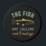 Funny Fishing Quote The Fish Are Calling I Must Go Magnet<br><div class="desc">Funny and humourous design for fisherman, angler, those who love river and lake fishing. This vintage, retro and distressed merchandise is great to wear on your fishing trip to the cabin by the wood. Bring your gears, fishing rod, fishing reel and let's catch some fish. Great Christmas gift and birthday...</div>