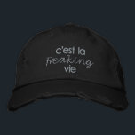 Funny French Quote in Black Embroidered Hat<br><div class="desc">A humourous twist on the french saying for enjoy and accepting life how it is - c'est la freaking vie - with a minimalism boho aesthetic. Cool gift for your francophile friend,  wanderlust travel bloggers,  and France lovers for casual weekend brunch dates and everyday around the house fun.</div>