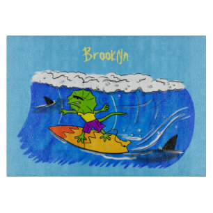 Funny frilled neck lizard surfing cartoon  cutting board