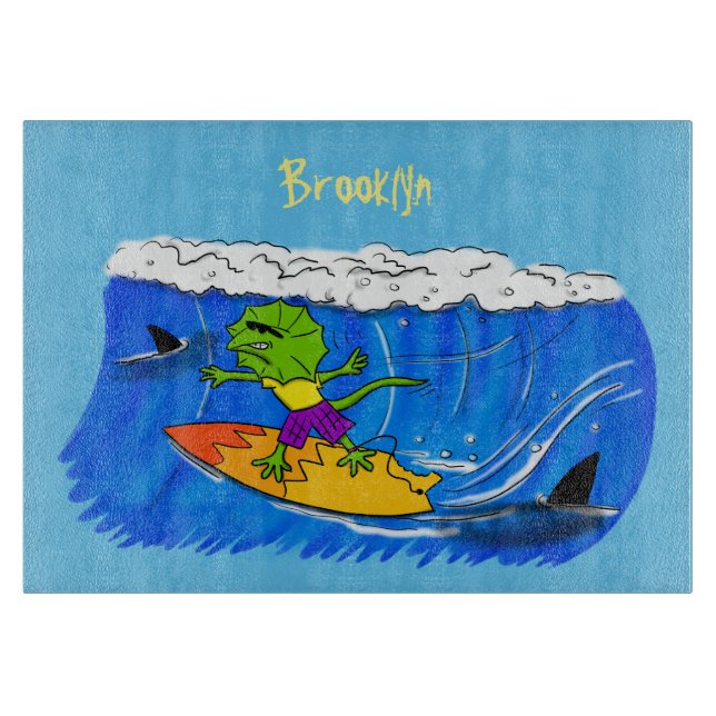 Funny frilled neck lizard surfing cartoon  cutting board (Front)