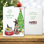 Funny German Shepherd Ready for Christmas Holiday Card<br><div class="desc">The German Shepherd dog on the front of this card states that he was "ready for Christmas" this year. He sits in front of a decorated Holiday tree, with a Santa sack of gifts beside him. One gift is already between his paws. The sentiment is continued on the inside, and...</div>