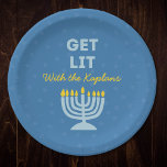 Funny "Get Lit" Chic Personalized Menorah Hanukkah Paper Plate<br><div class="desc">Celebrate Hanukkah in style with these fun "Get Lit" plates, perfect for serving latkes, jelly doughnuts, and all your holiday treats! Featuring a bright blue menorah illustration, customizable family name, and the playful phrase "Get Lit, " these plates add a joyful touch to your holiday table. Ideal for Hanukkah gatherings,...</div>