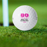 Funny Golf Balls 80th Birthday Party Monogrammed<br><div class="desc">Your golfer gal who is turning eighty will get a laugh from these personalized Golf Balls. Features a design with text that reads "80 Years and Still Swinging". (You can change the number to any year and colour to your choice.) Personalize with monogrammed initials, name or date. A perfect for...</div>