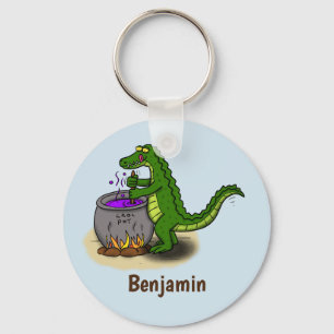 Funny green alligator cooking cartoon keychain