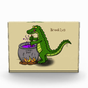 Funny green alligator cooking cartoon photo block