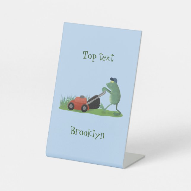 Funny green frog mowing lawn cartoon pedestal sign (Front)