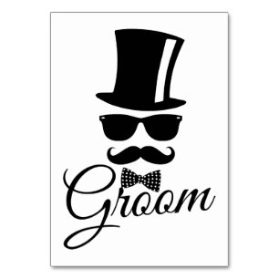 Funny groom  table number