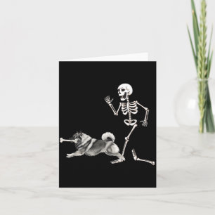 Funny Halloween Keeshond And Skeleton Card