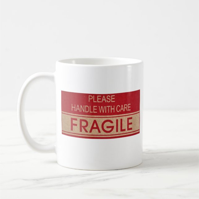 Funny handle with care, fragile sign coffee mug (Left)