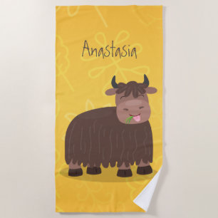 Funny happy yak eating grass cartoon illustration beach towel