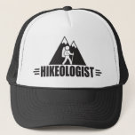 Funny Hiking Trucker Hat<br><div class="desc">HIKEOLOGIST. Humourous title for someone who loves hiking - and, who has a sense of humour. Makes a unique and funny gift for a hiker, trekker, mountain climber. A black and white design that features tall, snow-capped mountains in the background and a hiker with backpack in the foreground. Find more...</div>