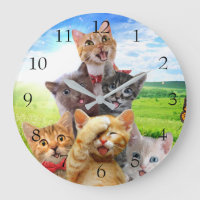 Funny kittens in green field.