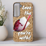 Funny Love The Wine You're With Message Samsung Galaxy Case<br><div class="desc">With a cork background and a glass of red wine in pouring action this phone case makes a fun gift idea for the wine lover.  Personalize or remove the text,  or edit using the design tool to select a font style,  size and colour you like.</div>