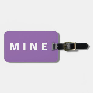 Funny luggage tag with 'Mine' written on it