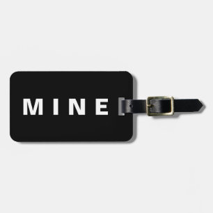 Funny luggage tag with 'Mine' written on it