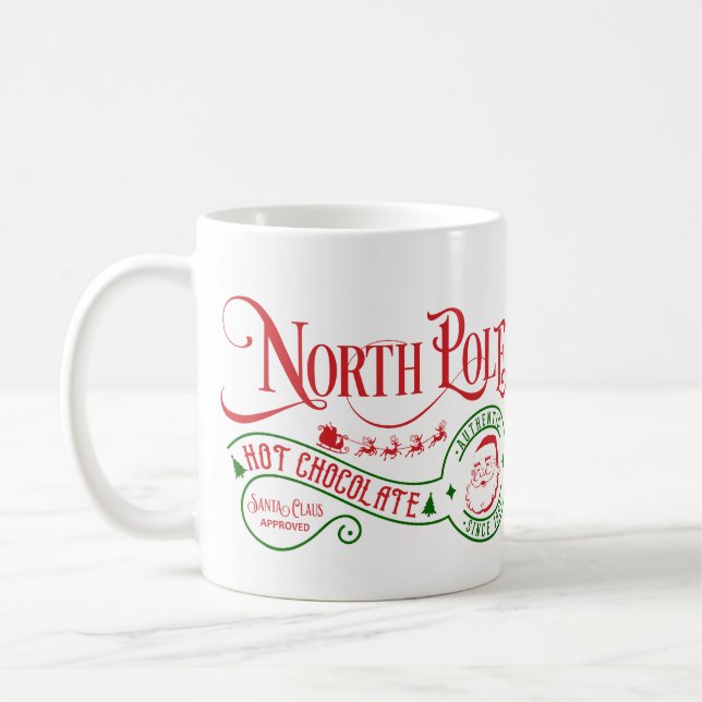 Funny North Pole Hot Chocolate Christmas Coffee Mug (Left)