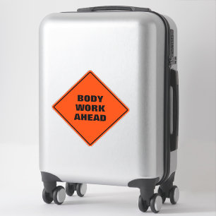 Funny orange body work ahead road sign
