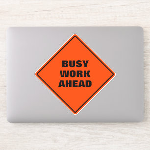 Funny orange busy work ahead pun road sign 