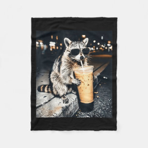 Funny raccoon drinking iced coffee fleece blanket