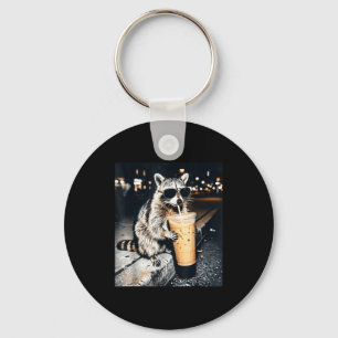 Funny raccoon drinking iced coffee keychain