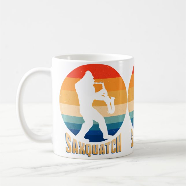 Funny Saxquatch A Sax And A Sasquatch Playing A Mu Coffee Mug (Left)