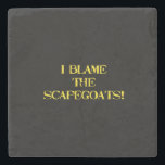 Funny Scapegoat Quote A Bold Statement on Blame Stone Coaster<br><div class="desc">This striking image delivers a punchy message—"I BLAME THE SCAPEGOATS!"—in distressed yellow stencil text against a stark black background. It's a satirical take on the human tendency to deflect responsibility,  making it perfect for social commentary,  humor,  or protest-themed content. #BlameCulture #SatireArt #ScapegoatStatement #BoldTypography</div>