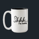 Funny Shhh...I'm reading Reader Two-Tone Coffee Mug<br><div class="desc">On National Book Day I was going through my books and know I'm always interrupted when trying to read. Someone might want a mug that says "Shhh..I'm reading."
So here you go, I hope it helps with your quiet time. A mug for the avid reader.</div>